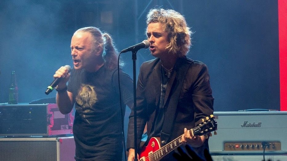 Featured image Dickinson and Armstrong perform All the Young Dudes onstage Watch