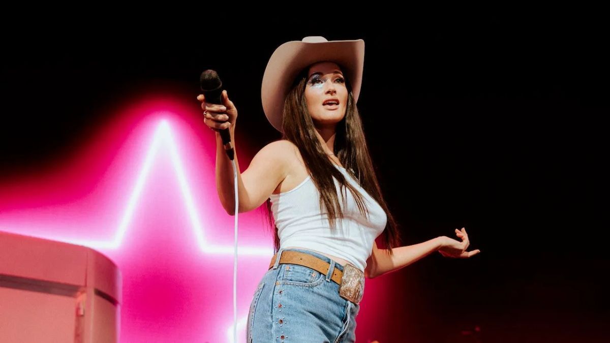 Featured image Kacey Musgraves hangs from disco balls at tour kickoff